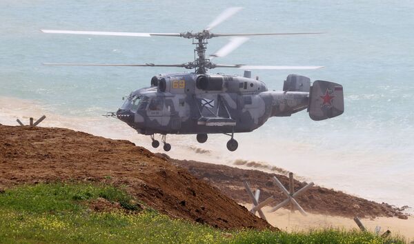 Вертолет Ка-29 во времяучений войск Южного военного округа и ВДВ на полигоне Опук в Крыму - Sputnik Moldova-România
