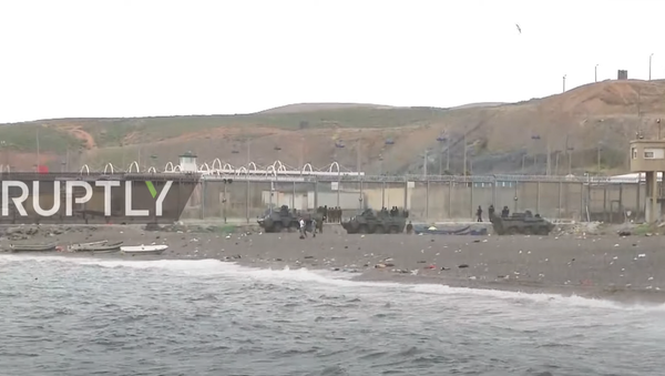 Spain: Police, military guard Ceuta border amid ongoing migrant crisis - Sputnik Moldova-România