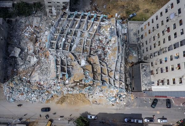 Turnul Al-Jalaa din orașul Gaza, care a fost demolat de un atac aerian israelian - Sputnik Moldova