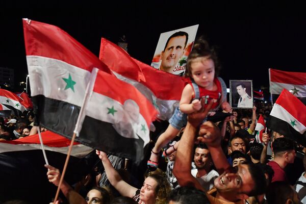 Sărbătorirea victoriei lui Bashar al-Assad la alegerile prezidențiale din Siria - Sputnik Moldova-România