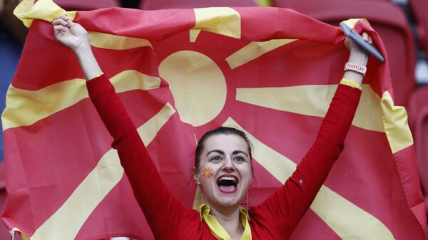 Болельщица Северной Македонии перед футбольным матчем группы C ЕВРО-2020 между Северной Македонией и Нидерландами  - Sputnik Moldova-România