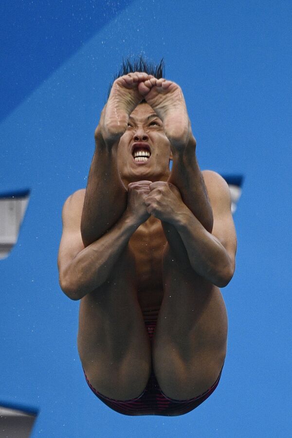 Японский прыгун в воду Ken Terauchi на Олимпийских играх в Рио-де-Жанейро. - Sputnik Молдова