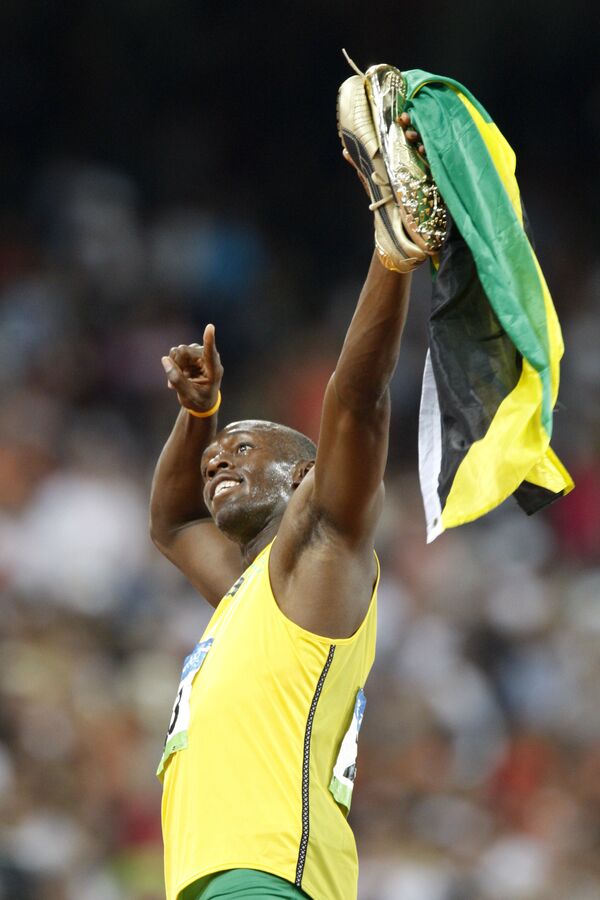 Atletul jamaican Usain Bolt la Jocurile Olimpice de vară de la Beijing - Sputnik Moldova-România