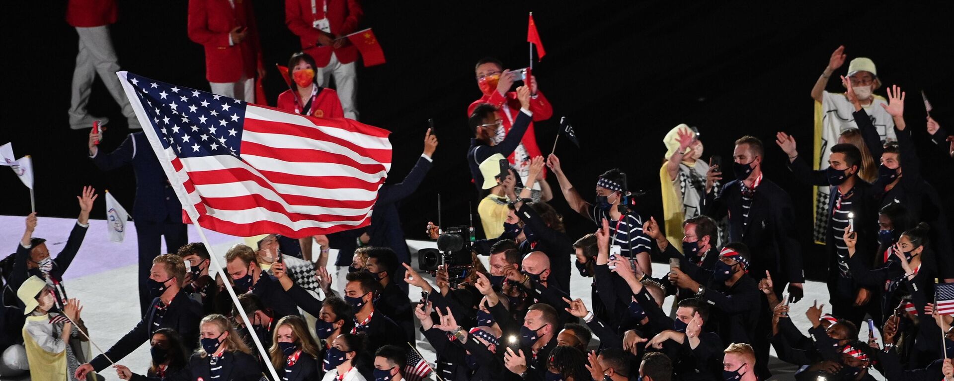 Спортсмены сборной США на параде атлетов на церемонии открытия XXXII летних Олимпийских игр в Токио. - Sputnik Молдова, 1920, 08.08.2021