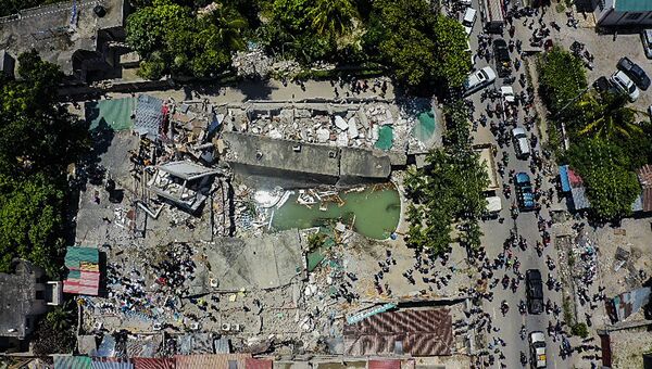 O vedere aeriană a hotelului Le Manguier distrus de un cutremur, în Les Cayes, Haiti, sâmbătă, 14 august 2021. Un cutremur cu magnitudinea 7,2 a lovit Haiti sâmbătă, cu epicentrul la aproximativ 125 de kilometri (78 mile) vest de capitală din Port -au-Prince, a declarat SUA Geological Survey. - Sputnik Moldova