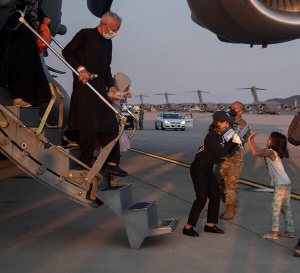 Прибытие афганских беженцев в Германию. - Sputnik Молдова