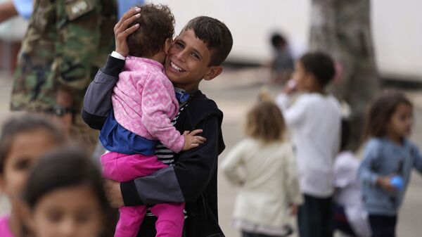 Эвакуированные афганские дети на авиабазе США Рамштайн в Германии - Sputnik Moldova-România