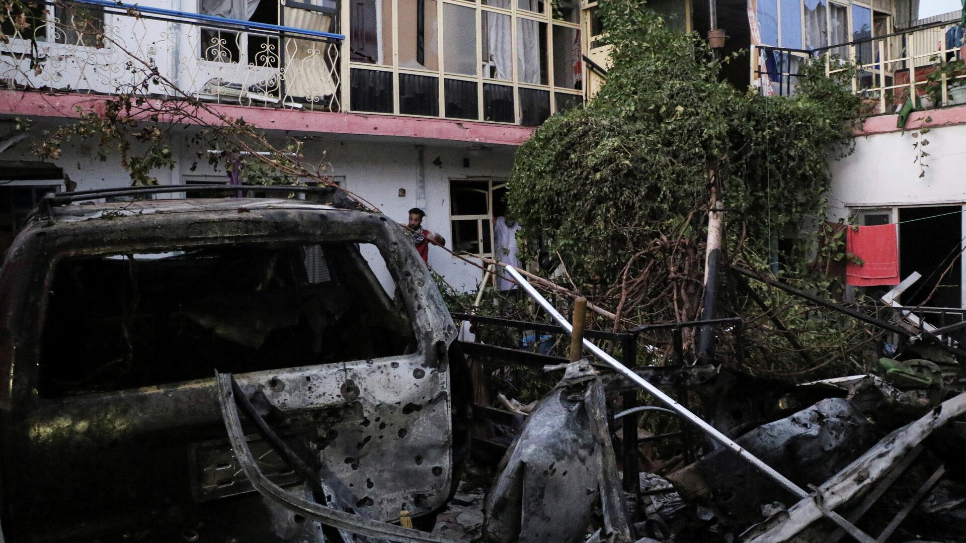 Общий вид жилого дома, разрушенного в результате ракетного обстрела в Кабуле - Sputnik Moldova-România, 1920, 31.08.2021