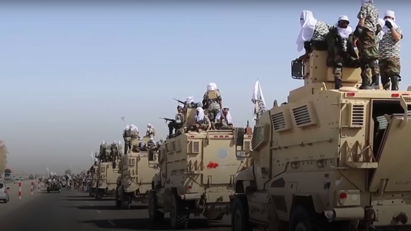 Taliban hold parade with US military vehicles left behind in Kandahar - Sputnik Moldova-România