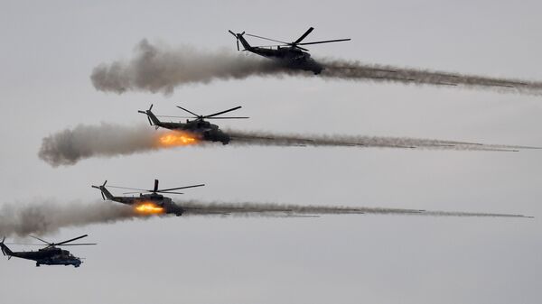 Ударные вертолеты Ми-24 во время основного этапа учений Запад-2021 на полигоне Мулино в Нижегородской области - Sputnik Молдова