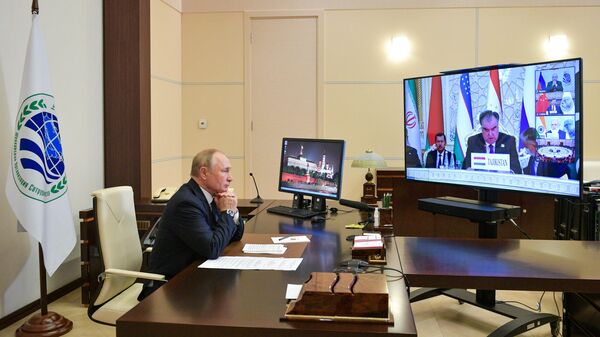 Президент РФ В. Путин по видеосвязи принял участие в заседании Совета глав государств - членов ШОС - Sputnik Moldova-România