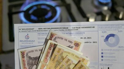 Квитанция на фоне газовой плиты