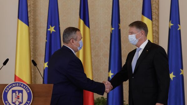 Klaus Iohannis și Nicolae Ciucă - Sputnik Moldova-România