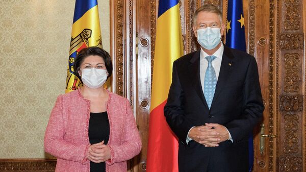 Встреча премьера Натальи Гаврилицы и президента Румынии Клауса Йоханниса в Бухаресте - Sputnik Молдова