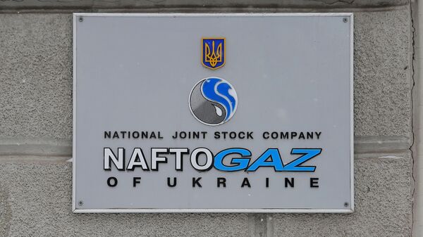 Вывеска на здании нефтегазовой компании Нафтогаз Украины в Киеве - Sputnik Молдова