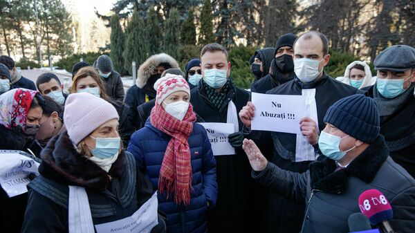 Mai mulți avocați au organizat un protest la Parlament - Sputnik Молдова