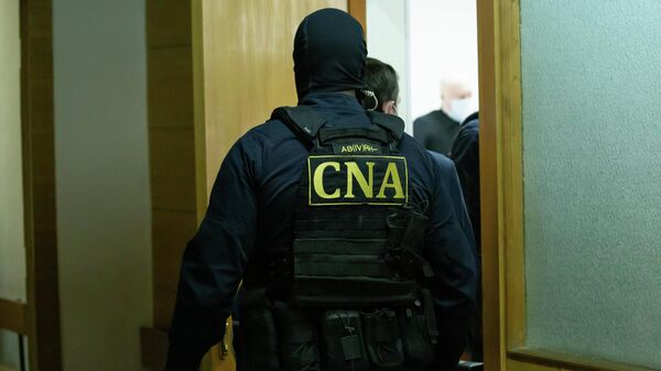 Офицеры НАЦ в суде - Sputnik Молдова