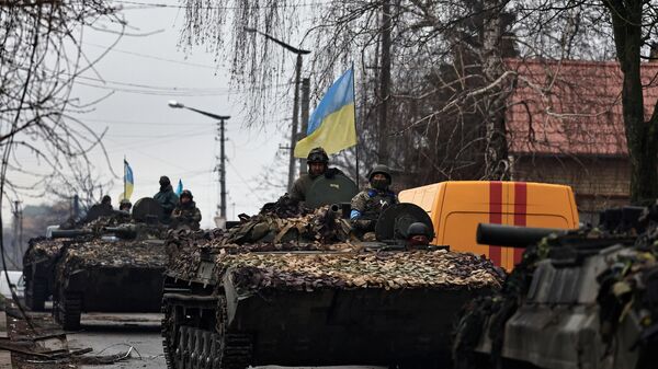 Militari ucraineni în Bucia - Sputnik Moldova