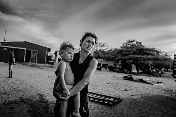Снимок из серии Venezuelan Migrant, Colombia датского фотографа Jan Grarup, победивший в категории Professional DocumentaryProjects фотоконкурса 2022 Sony World Photography Awards.  - Sputnik Молдова