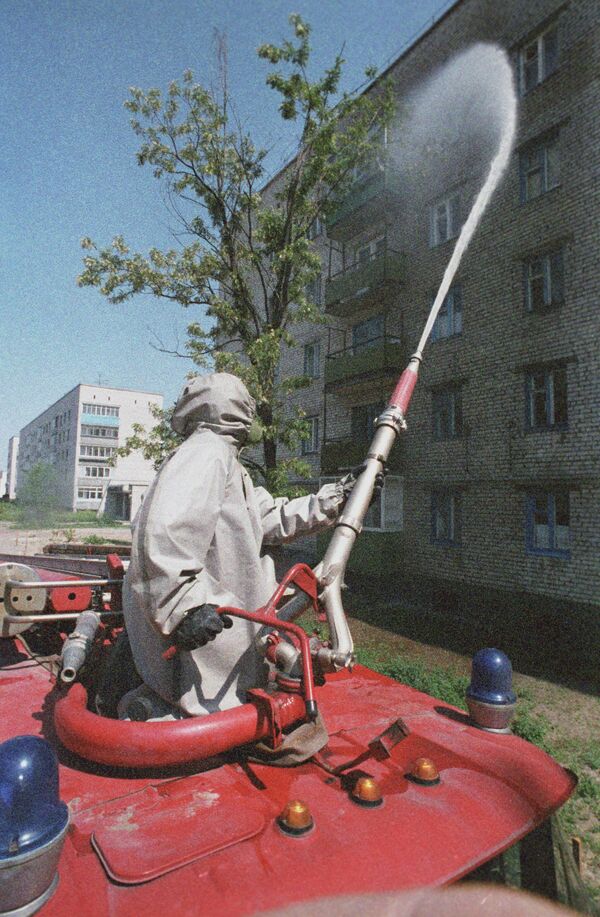 Consecințele accidentului de la centrala nucleară de la Cernobîl, 1986. Decontaminare în orașul Pripeat, regiunea Kiev. - Sputnik Moldova-România
