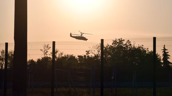 Elicopter de luptă în timpul operațiunii militare speciale din Donbas - Sputnik Moldova-România