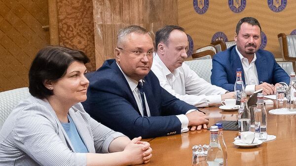 Наталья Гаврилица на заседании правительства в Бухаресте - Sputnik Молдова