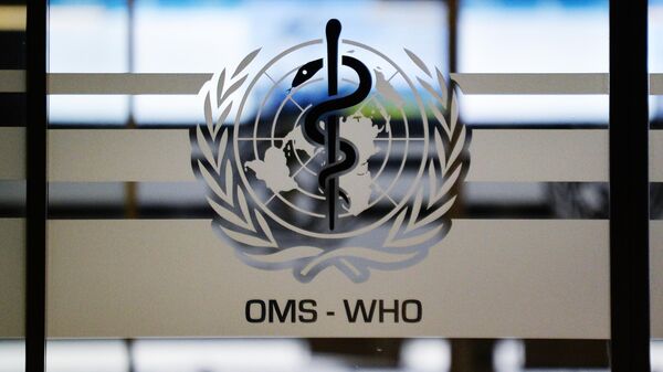 Эмблема Всемирной организации здравоохранения (ВОЗ) на дверях штаб-квартиры. - Sputnik Moldova-România