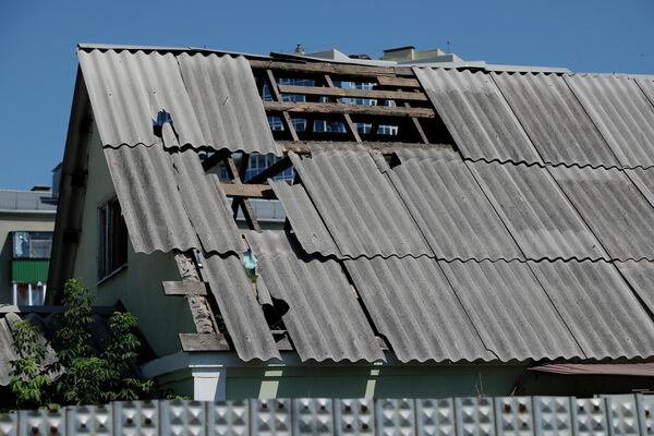 Casă cu acoperișul deteriorat în Belgorod. - Sputnik Moldova
