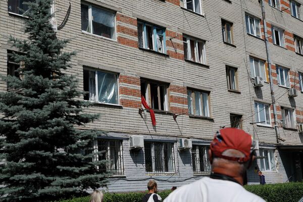 Casă de locuit cu geamurile sparte în Belgorod. - Sputnik Moldova