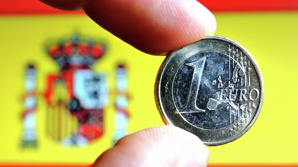 Moneda euro și flagul Spaniei - Sputnik Moldova-România
