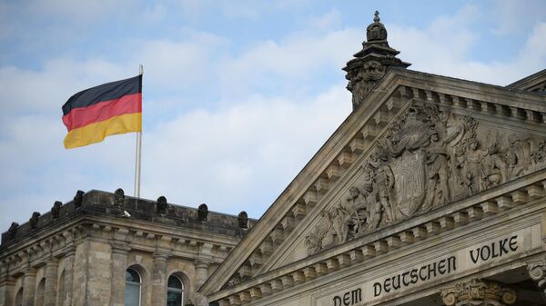 Флаг Германии над зданием Бундестага - Sputnik Молдова