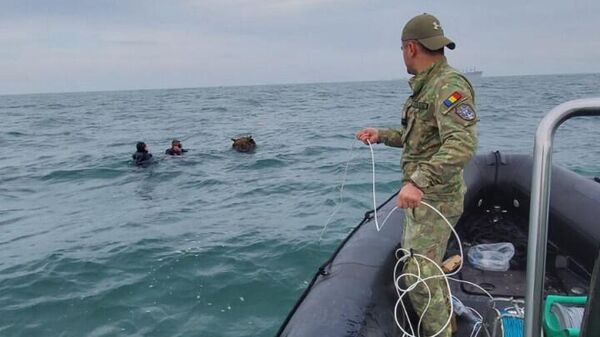 ВМФ Румынии обезвредило морскую мину в Черном море - Sputnik Молдова