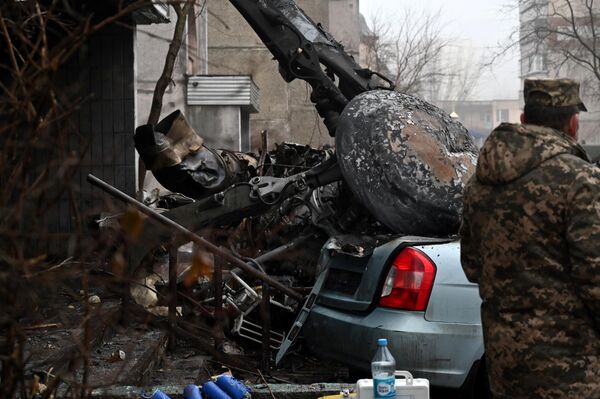 На месте падения вертолета в Броварах, Украина. - Sputnik Молдова