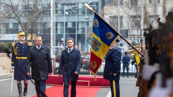 Premierul moldovean Dorin Recean în vizită la București, întâlnire cu omologul său român Nicolae Ciucă - Sputnik Молдова