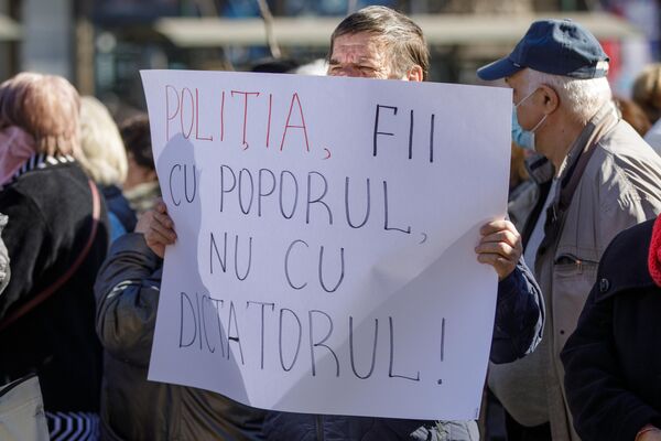 Flashmob organizat de Mișcarea Pentru Popor, la MAI: Cerem respectarea dreptului universal al cetățenilor de a protesta - Sputnik Moldova