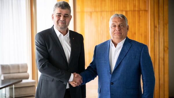 Premierul României, Marcel Ciolacu și omologul său ungar, Viktor Orban - Sputnik Moldova