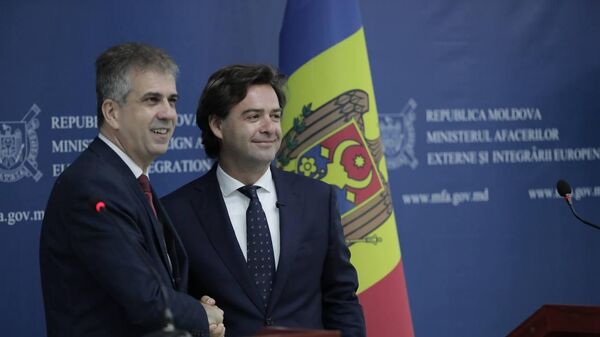 Министр иностранных дел Государства Израиль Эли Коэн (слева) и глава МИДЕИ Молдовы (справа) на встрече в Кишиневе - Sputnik Молдова