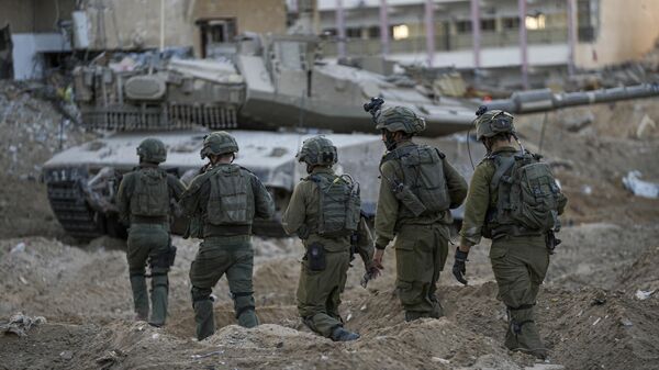 Израильские военные во время наземной операции в Газе - Sputnik Moldova