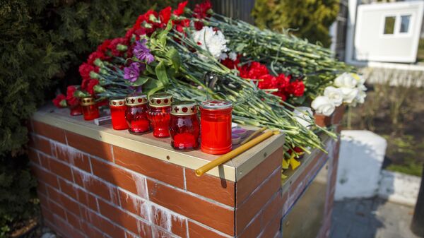 Locuitorii Chișinăului au adus un omagiu victimelor atacului terorist de la Crocus  City Hall - Sputnik Moldova