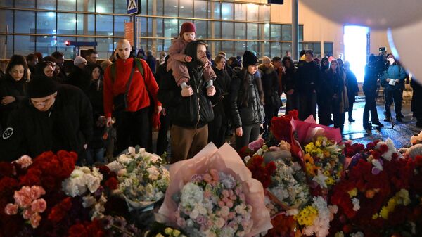 Акции памяти жертв теракта в Крокус Сити Холле - Sputnik Молдова
