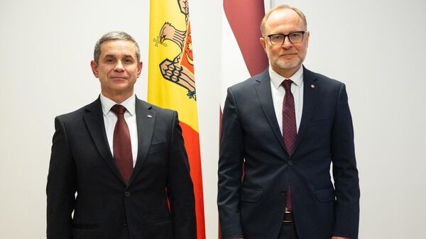 Colaborarea moldo-letonă, discutată la Riga de ministrul Anatolie Nosatîi și omologul său, Andris Sprūds - Sputnik Moldova