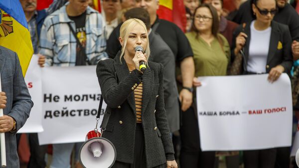 Акция протеста у здания парламента Молдовы в поддержку депутатов группы Победа, которых лишили возможности участия в заседаниях 14.06.2024 - Sputnik Молдова