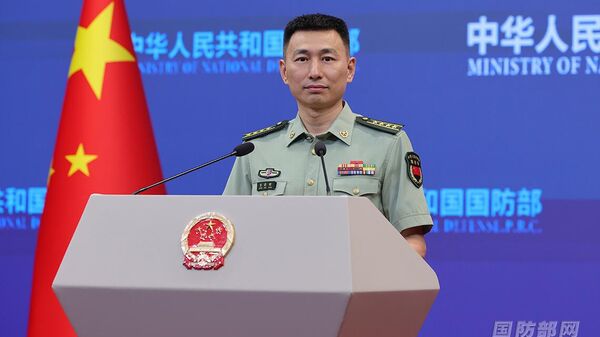 Официальный представитель министерства обороны КНР Чжан Сяоган - Sputnik Moldova