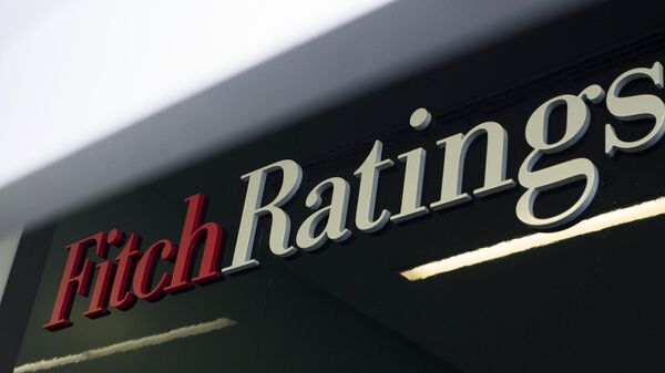 Логотип рейтингового агентства Fitch Ratings - Sputnik Молдова