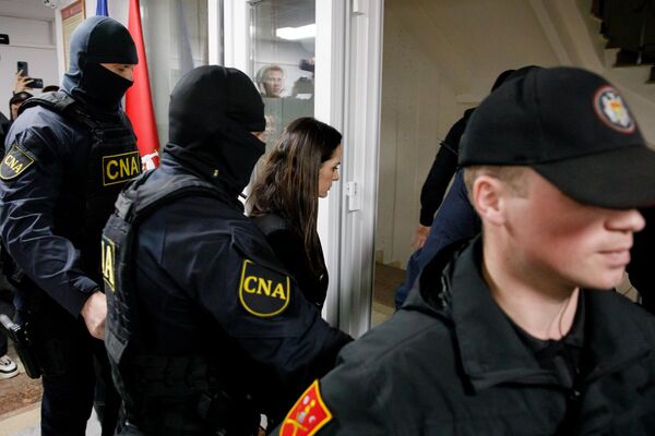 Башкан Гагаузии Евгения Гуцул в здании суда сектора Чеканы Башкан Гагаузии Евгения Гуцул в здании суда сектора Чеканы - Sputnik Молдова