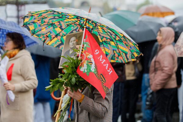 Марш Победы и шествие Бессмертного полка в Кишиневе 9 мая Марш Победы и шествие Бессмертного полка в Кишиневе 9 мая - Sputnik Молдова