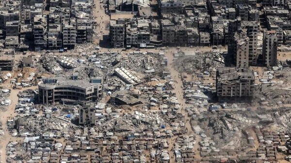 Палаточные лагеря беженцев и руины вместо жилых кварталов: The Washington Post показала свежие кадры из разрушенного сектора Газа - Sputnik Молдова