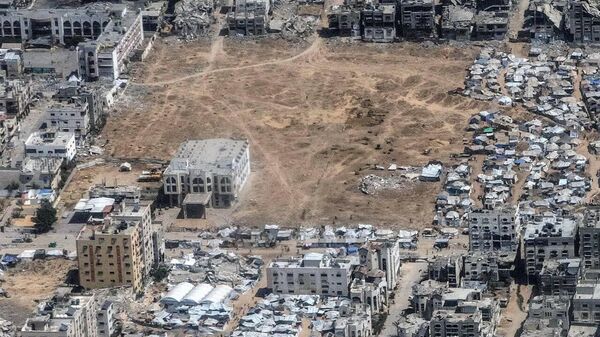 Tabere de refugiați cu corturi și clădiri ruinate în loc de cartiere rezidențiale: The Washington Post a prezentat noi imagini din devastata Fâșie Gaza - Sputnik Moldova