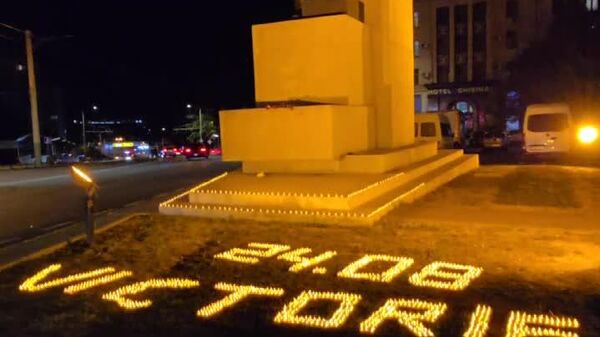 Acțiunea „Lumânarea Memoriei” a avut loc la monumentul Eliberatorilor Chișinăului - Sputnik Moldova