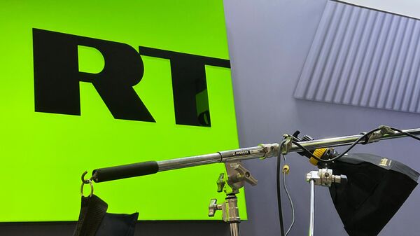 Logotipul canalului de televiziune  RT. - Sputnik Moldova